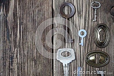 Vintage keys and keyholes Stock Photo