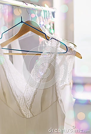 Vintage lace bridal lingerie on hangers Stock Photo