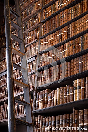 Vintage library with wooden ladder. Stock Photo