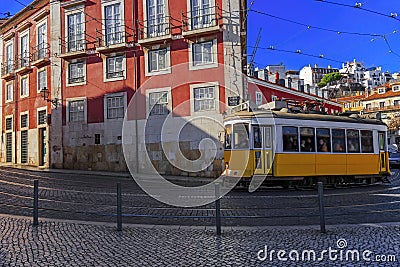 Vintage Lisbon tram on city street Stock Photo