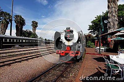 Vintage locomotive steam train against blue sky Stock Photo