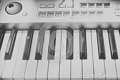 Vintage looking Detail of black and white keys on music keyboard Stock Photo