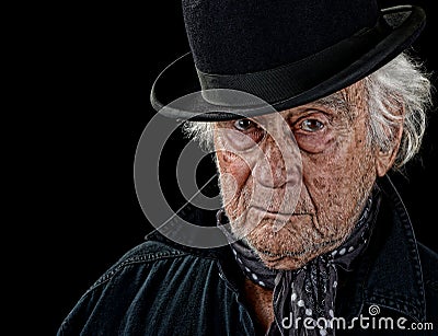 Old man wearing a bowler hat Stock Photo