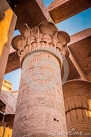 Vintage lotus flower decorates the top of the columns at Kom Ombo Temple Stock Photo