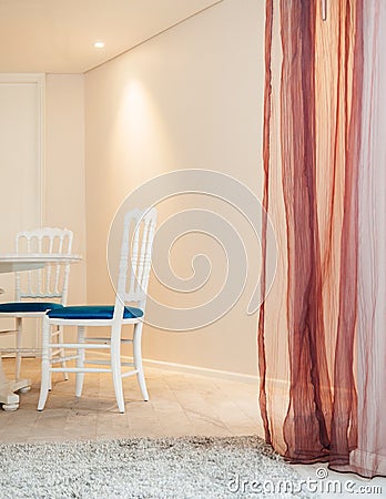 Vintage luxury interior white wood chairs with carpet and pink curtain Editorial Stock Photo