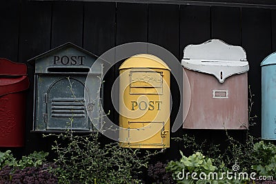 Vintage mailbox. Beautiful old-fashioned mailboxes black yellow red. Shabby weathered postbox set Stock Photo