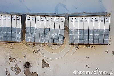 Vintage mailboxes on the old wall of the house Stock Photo