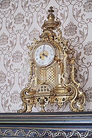 Vintage mantel clock in Baroque style Stock Photo