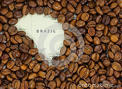 Map of Brazil covered by a background of roasted coffee beans Stock Photo