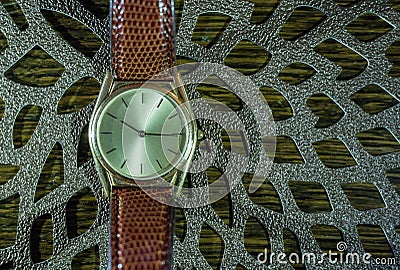 Vintage men`s watch, brown-gold color in close up shot Stock Photo