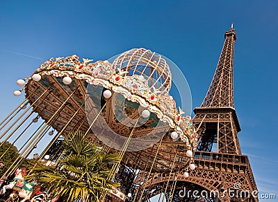 Vintage merry-go-round and the Eiffel tower Stock Photo