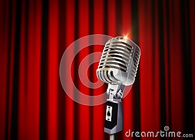 Vintage Microphone over Red Curtains Stock Photo