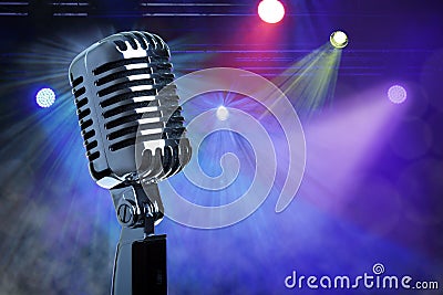 Vintage microphone on stage Stock Photo