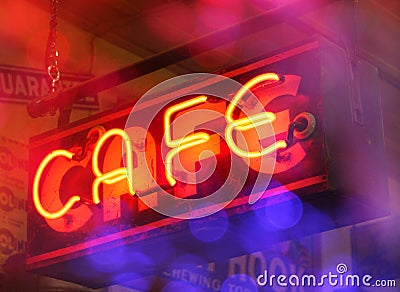 Vintage Neon Cafe Sign With Colorful Bokeh Stock Photo