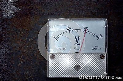 Vintage old analog volt meter scale of measurement device Stock Photo