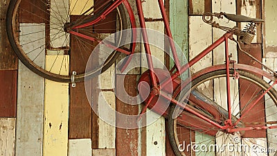 Vintage Old Bicycle on Colorful Wood Background Stock Photo
