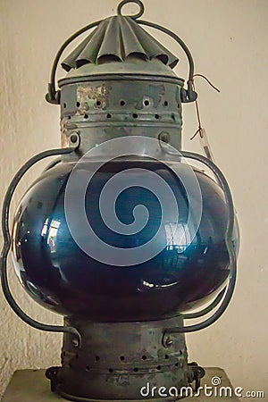 Vintage old blue submarine signal lamp, a visual signaling device for optical communication. Stock Photo