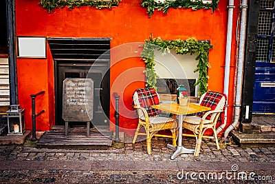 Vintage old fashioned cafe chairs with table in Copenhagen Stock Photo