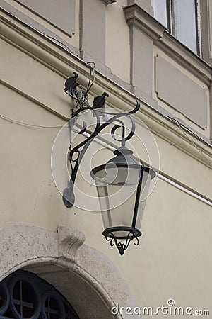 Vintage Old Street Classic Iron Lantern On The House Wall, Close Up Stock Photo