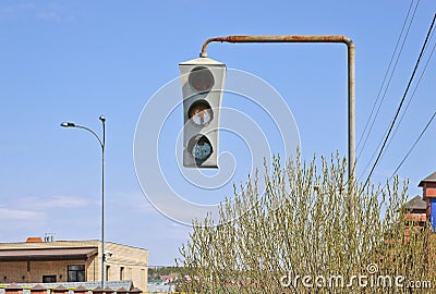 Vintage old traffic light on a rusty post. Close-up Stock Photo
