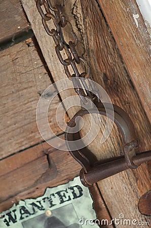 Vintage old western prison shackles and reward fug Stock Photo