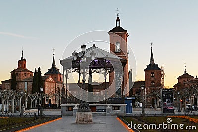 Vintage openwork gazebo, beautiful lamppost against the background of beautiful buildings Editorial Stock Photo