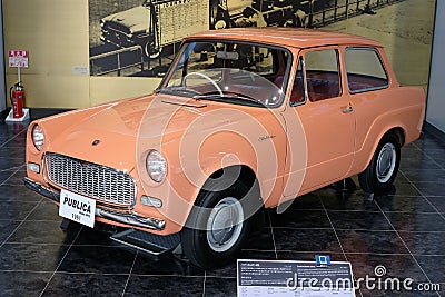 Vintage orange pink Publica car on display in the Toyota Motor Museum in Japan Editorial Stock Photo