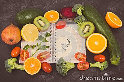 Vintage photo. Natural fruits with vegetables as source vitamins and notepad with word diet, healthy nutrition concept Stock Photo