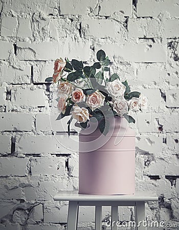 Vintage pink cans with flowers, toned blurred image, selective f Stock Photo