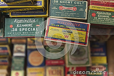 Vintage pistol bullet cartridge ammo boxes by Remington and Winchester at a gun shop, 38 caliber and 38 short Editorial Stock Photo