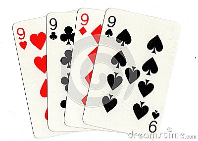 Vintage playing cards showing a hand of four nines. Stock Photo