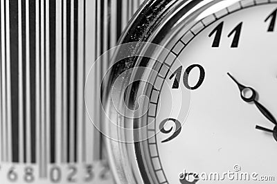 Vintage pocket watch in focus, barcode on the background, conceptual time for shopping image Stock Photo