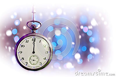 Vintage pocket watch striking midnight Stock Photo