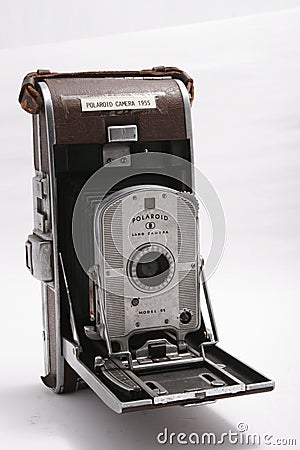 Vintage polaroid camera against a white background Editorial Stock Photo