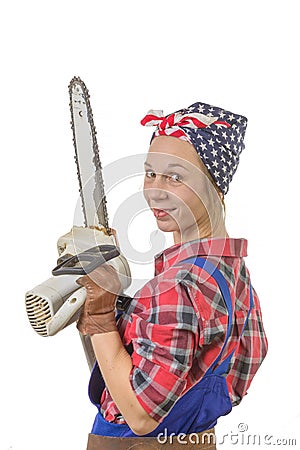 Vintage pretty young woman with a chainsaw Stock Photo