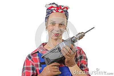 Vintage pretty young woman with a drill Stock Photo