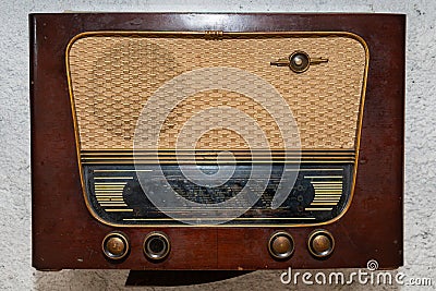 Vintage radio. Retro broadcast table radio receiver. Very old radio. Stock Photo