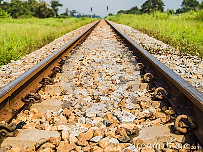 Vintage railway with ballast and rail sleepers in countryside, T Stock Photo