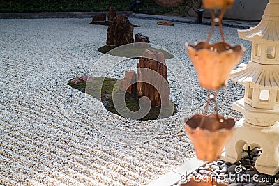 Vintage rain waters way-out in zen garden Stock Photo