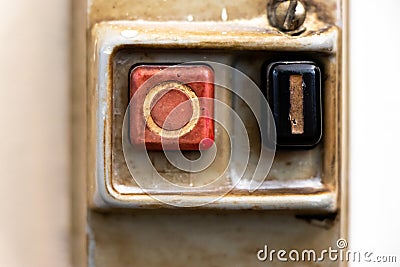 Vintage red and black switch button use for open and close the equipment or machine Stock Photo