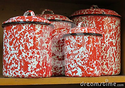 Vintage red graniteware canister set Stock Photo