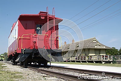 Red caboose and Katy Depot Editorial Stock Photo
