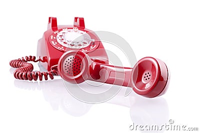 Vintage red rotary phone (with clipping path) Stock Photo