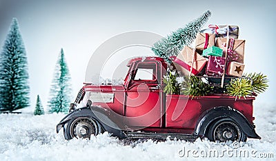 Vintage red truck delivering Christmas gifts Stock Photo