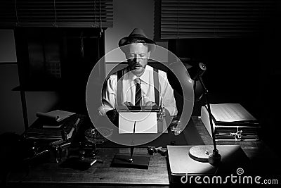 Vintage reporter working late at night Stock Photo