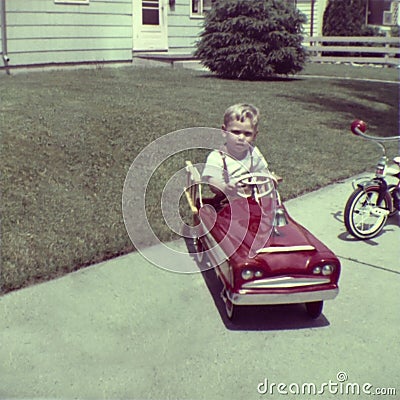 Vintage Retro Photo Young Boy Play in Pedal Car Stock Photo