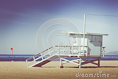 Vintage retro picture of wooden lifeguard tower, Beach in Califo Stock Photo