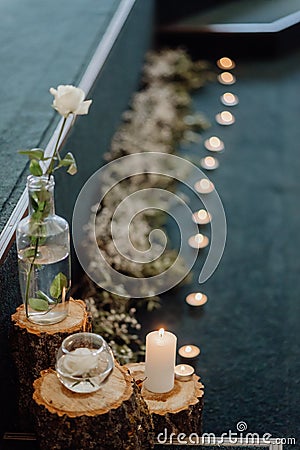 Vintage romantic candles decor. Toned and noise image. Stock Photo