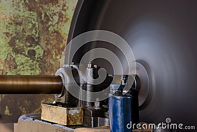 Vintage Rotating Flywheel Stock Photo