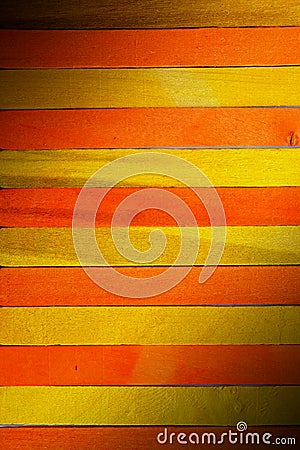 Vintage rough yellow punctuate with orange color wooden partition wall texture background. Stock Photo